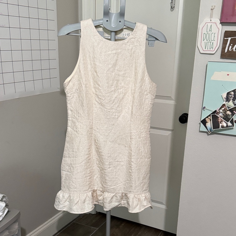 TCEC Cream Sleeveless Dress with Ruffle Hem